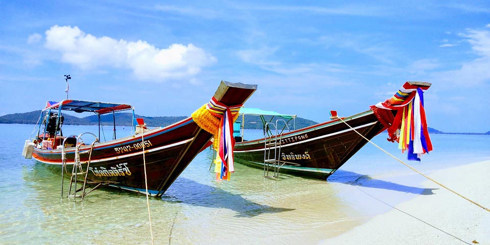 Two boats on the shore of Koh Samui, Thailand.