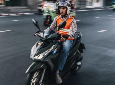 A photo of motorcycle taxi in Bangkok